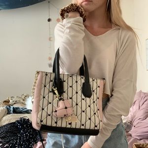 Such an adorable betsey johnson bag!! 💖💖